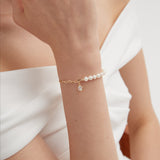 STMG Natural Pearl with CZ Diamond Bracelet on hand