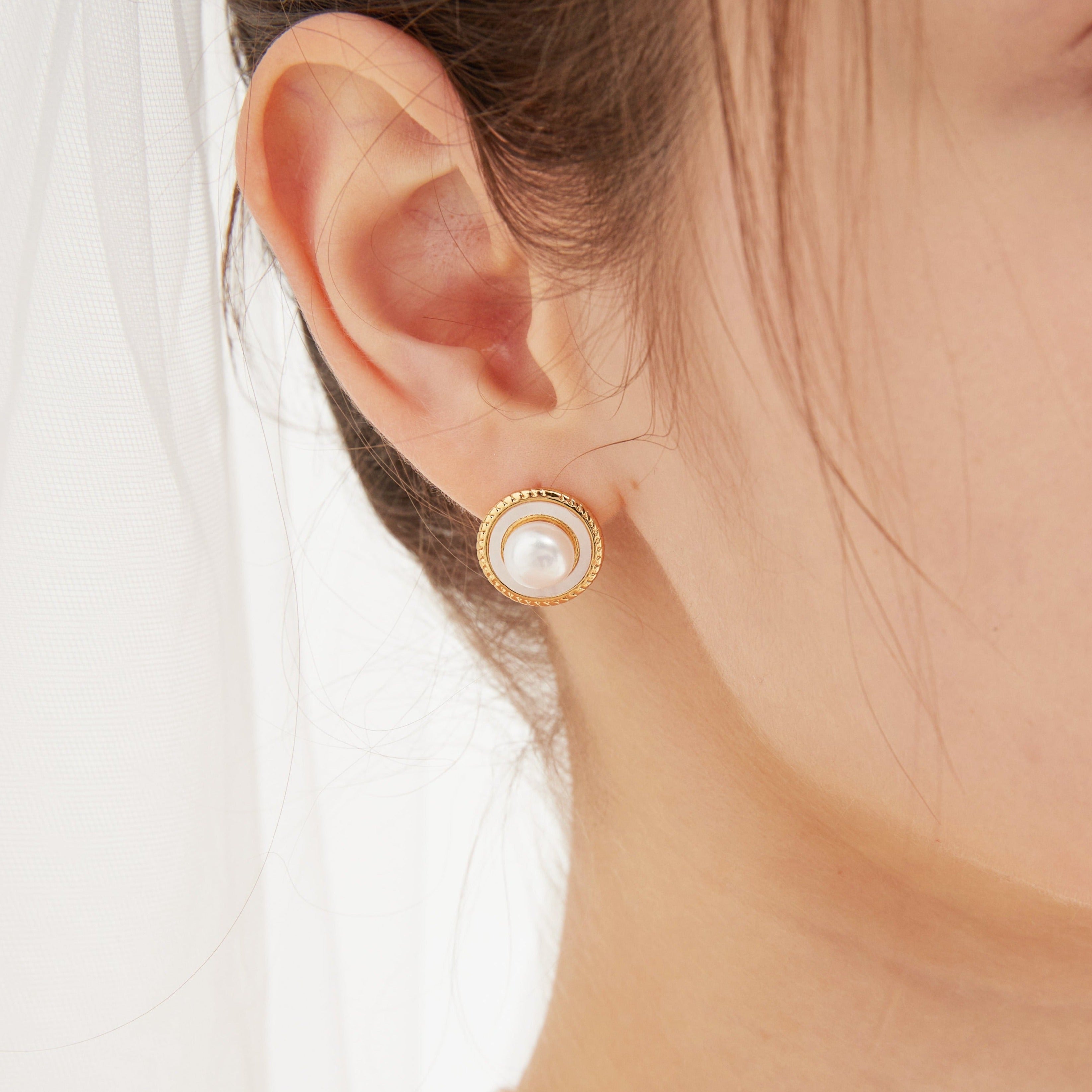 STMG Natural Pearl Stud Earrings on ear