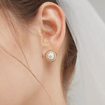 STMG Natural Pearl Stud Earrings on ear