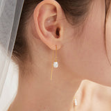 STMG Natural Pearl Dangle Threader Earrings in gold on ear