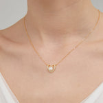 STMG Pearl Heart Necklace on neck