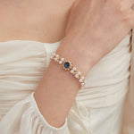 STMG Pearl with Sapphire Bracelet on hand