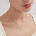 STMG Pearl Daisy Necklace in gold