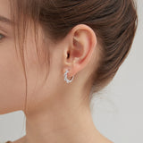 STMG Pearl Wreath Hoops in silver on ear