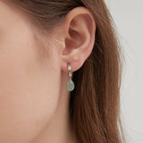 STMG Natural Aventurine Dangle Earrings in silver on ear