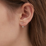 STMG Minimalist Diamond Stud Earrings in silver on ear