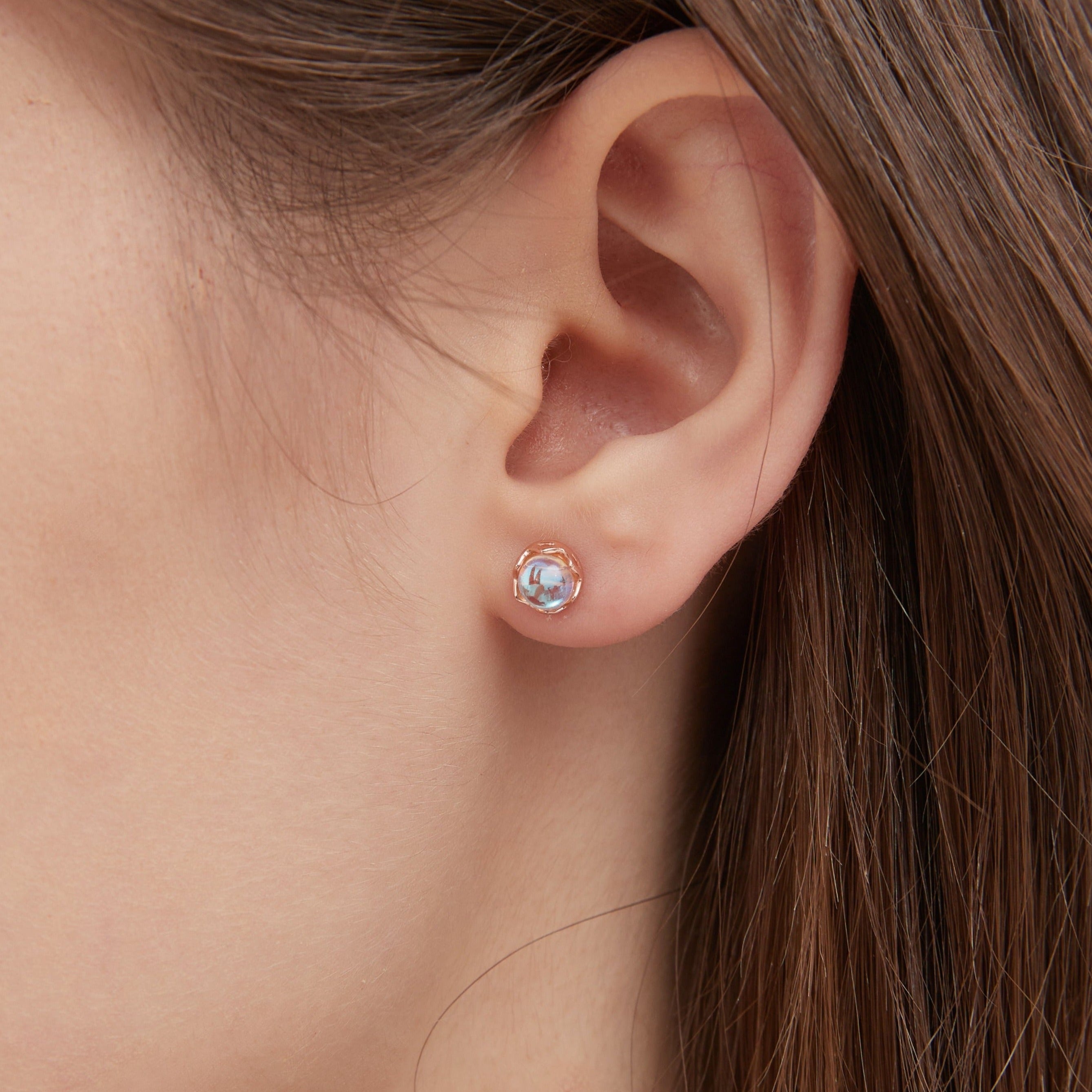 STMG Moonstone Stud Earrings in champagne gold on ear