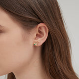 Bird and Feather Stud Earrings on ear