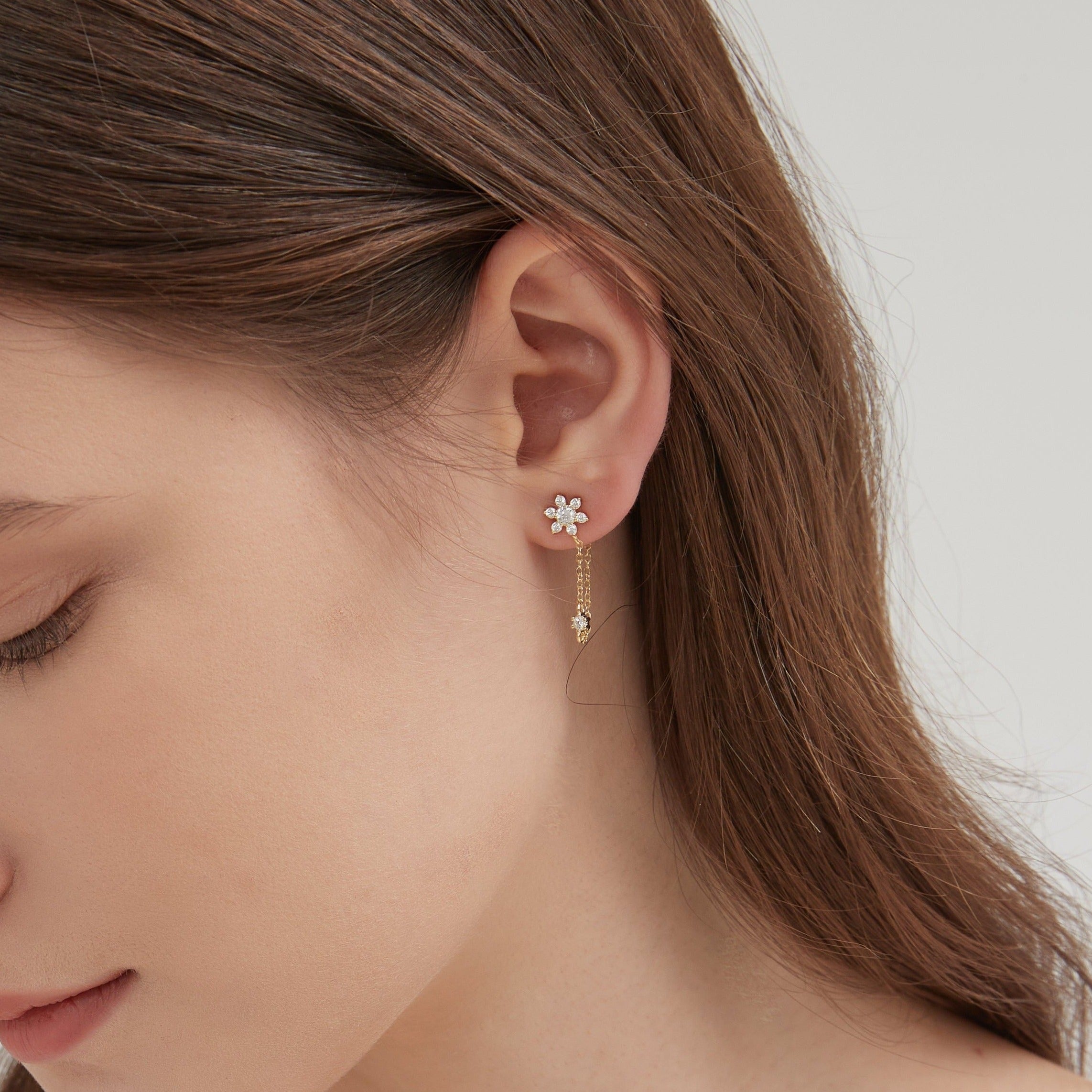 Bauhinia Dangle Earrings on ear