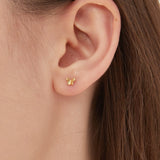 Butterfly Stud Style Earrings in gold on ear