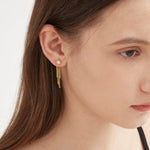 STMG Natural Pearls with CZ Star Dangle Earrings on ear