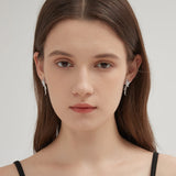 Bowknot Stud Earrings on ear