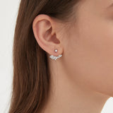 Angel Wing Stud Earrings in silver on ear