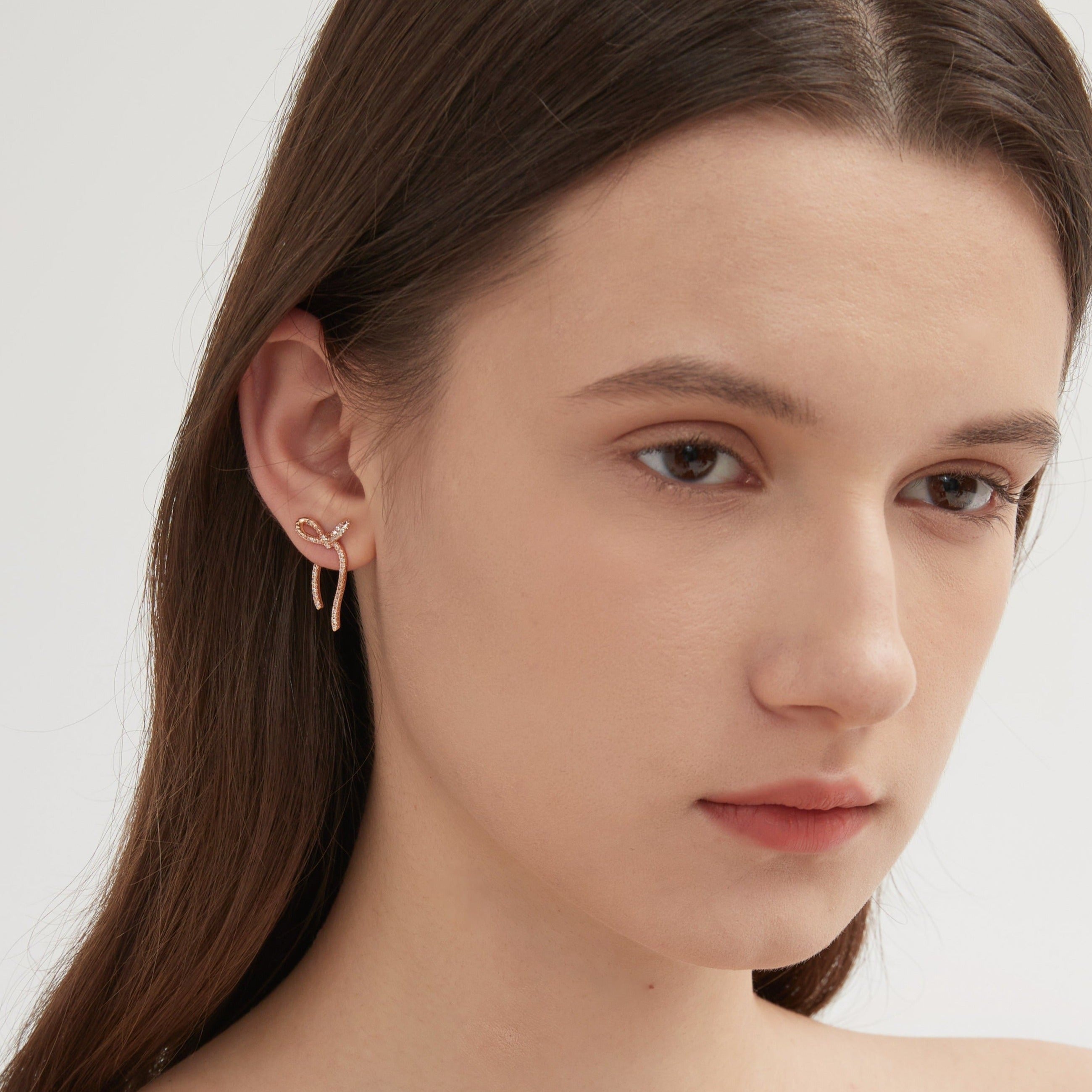 Bowknot Stud Earrings on ear