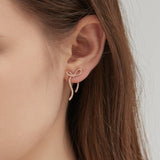 Bowknot Stud Earrings on ear