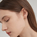 STMG Minimalist Rhombus Stud Earrings on ear