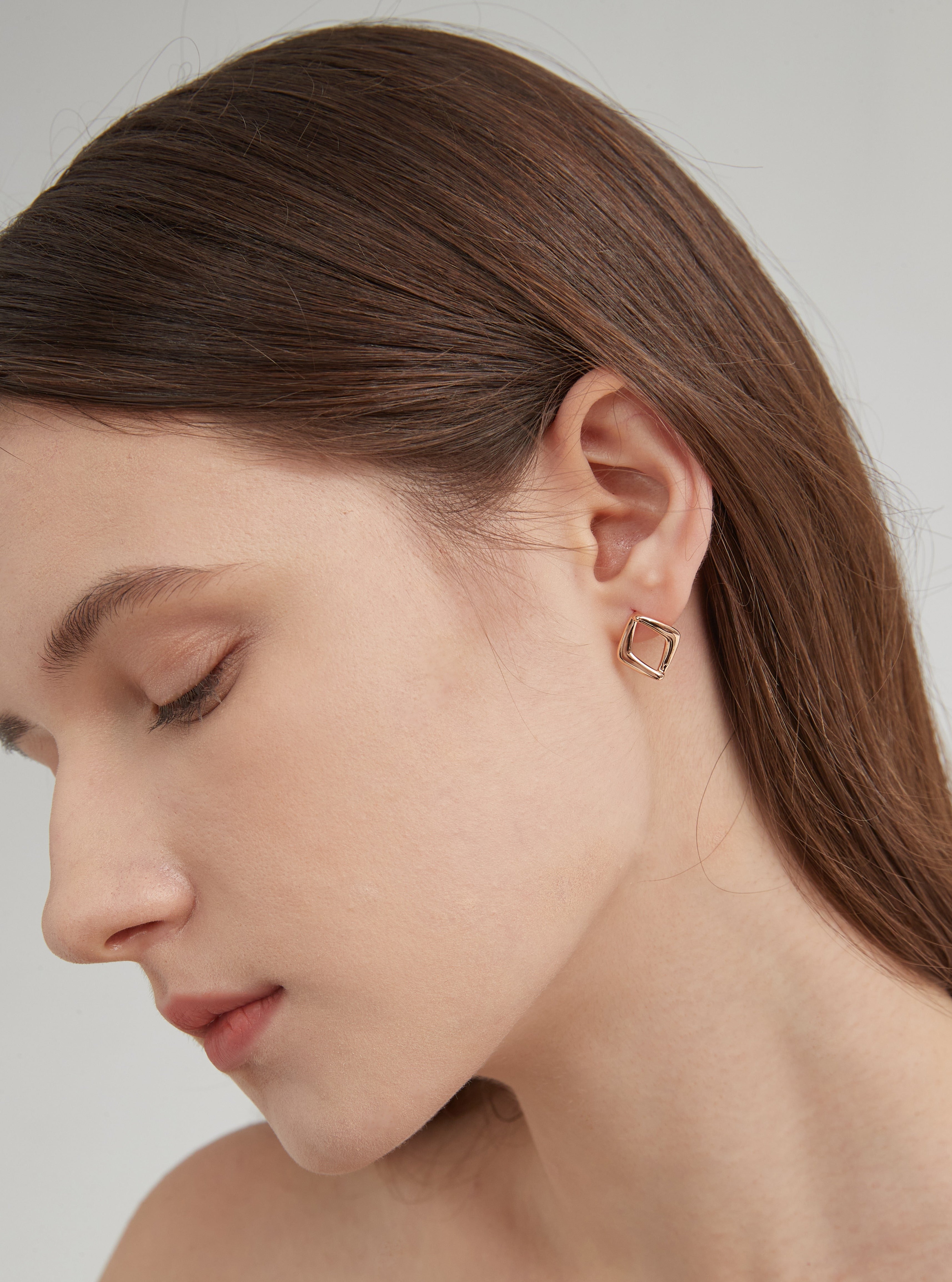 STMG Minimalist Rhombus Stud Earrings on ear