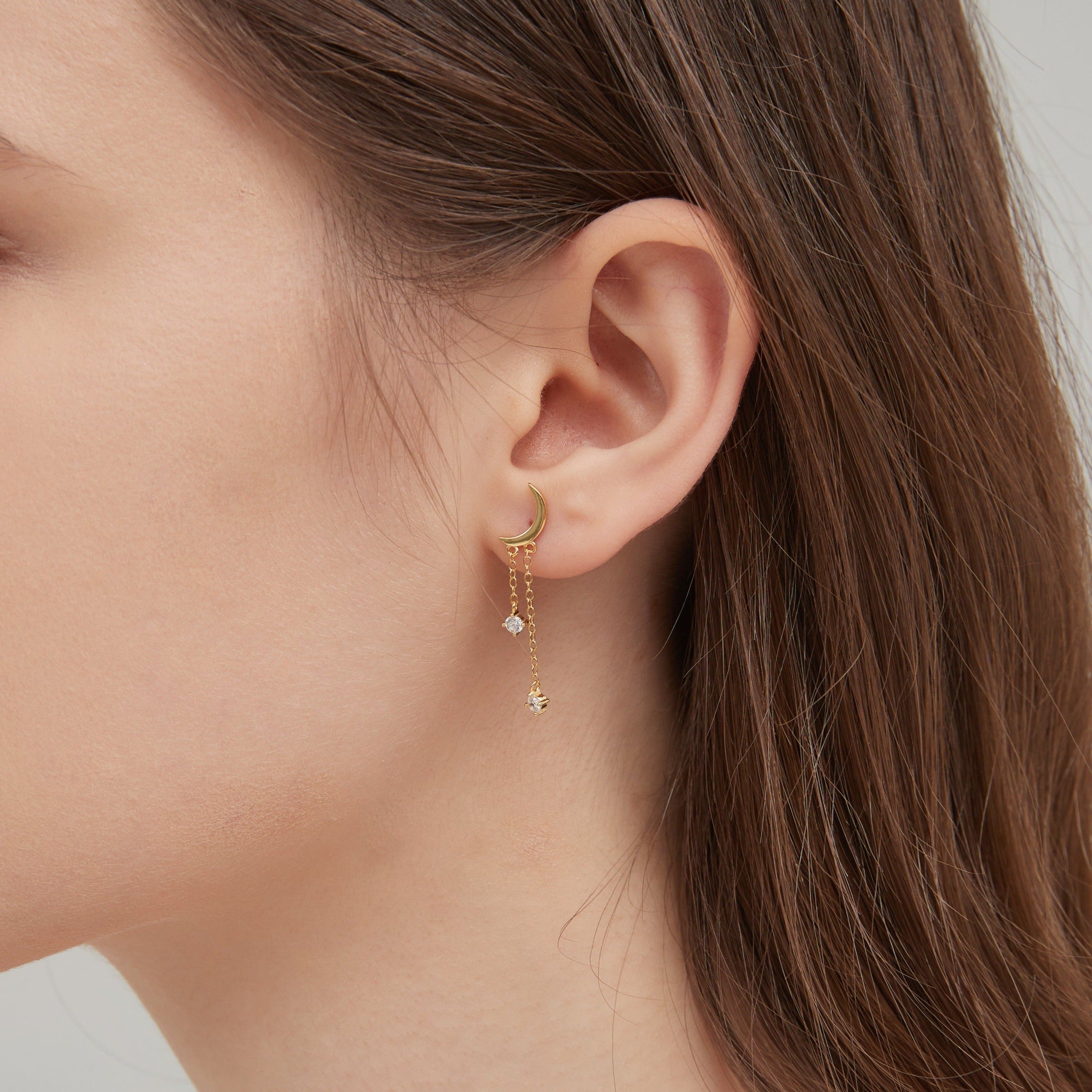 STMG Moon with Star Dangle Earrings in gold on ear