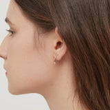 Droplet Hook Earrings in silver on ear