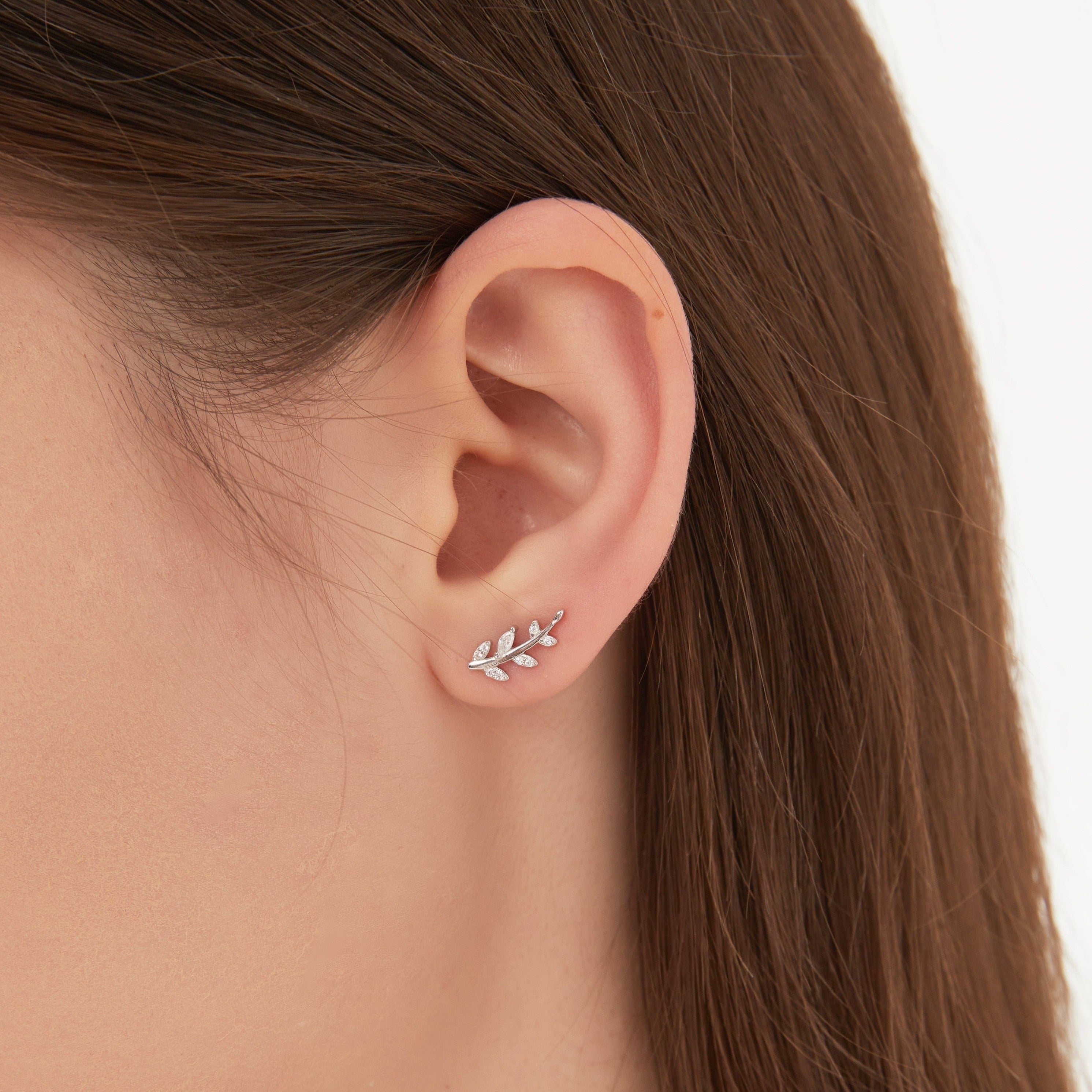 STMG Olive Leaf Stud Earrings in silver on ear