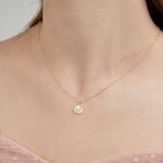 STMG Pearl on Seashell Necklace on neck