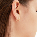 STMG Sweet Heart Hoops in gold on ear