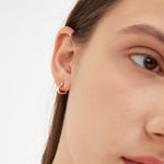 STMG Sweet Heart Hoops in gold on ear