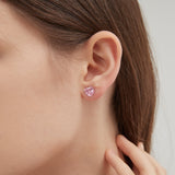 STMG Pink Heart Stud Earrings on ear