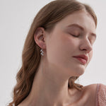 STMG Olive Leaf Threader Earrings on ear