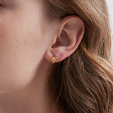 STMG Minimalist Bowknot Hoops in gold on ear