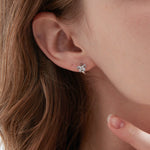 STMG Minimalist Bowknot Hoops in silver on ear