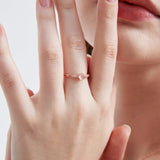 STMG Natural Rose Quartz Ring on finger