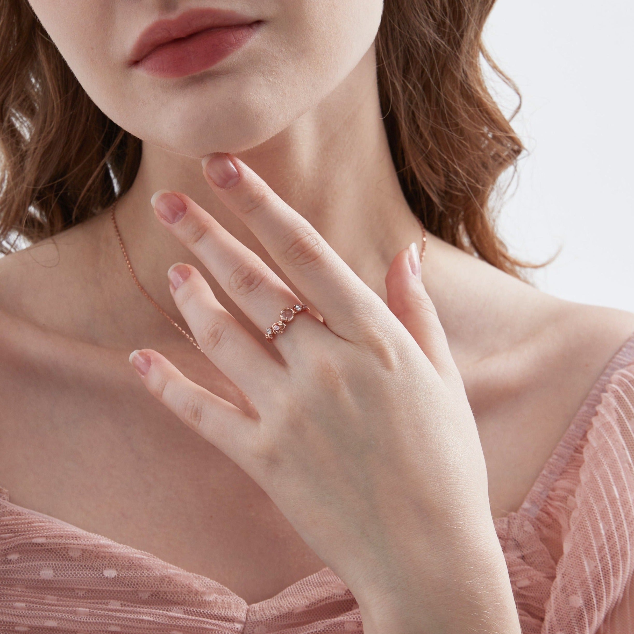 STMG Rose Quartz Ring on finger