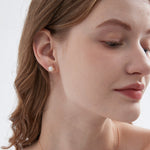 STMG Natural Pearl Stud Earrings on ear