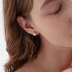 STMG Natural Pearl Stud Earrings on ear