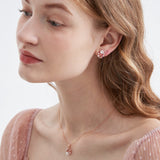 Flower Wreath Stud Earrings on ear with necklace on neck