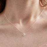 STMG Tiny Daisy Necklace on neck