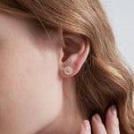 STMG Tiny Daisy Stud Earrings on ear