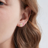 STMG Tiny Daisy Stud Earrings on ear