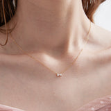 STMG Tiny Bowknot Necklace on neck