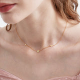 STMG Sweet Heart Necklace in gold on neck