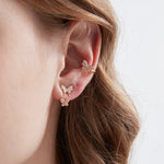 STMG Tiny Butterfly Stud Earrings on ear