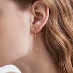 STMG Moon and Star Threader Earrings in gold on ear