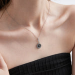 Blue Sandstone Moon Phase Necklace in silver on neck