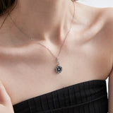 Blue Sandstone Moon Phase Necklace in silver on neck