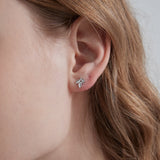 STMG Maple Leaf Stud Earrings in silver on ear