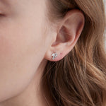 STMG Maple Leaf Stud Earrings in silver on ear