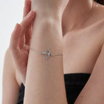 Cupid Bow And Arrow Bracelet in silver on hand