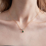 STMG Green Emerald Necklace on neck