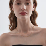 STMG Mirror Chain Necklace on neck with matching earrings